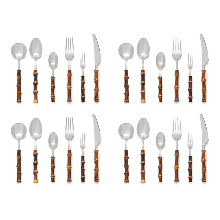 Four place settings of stainless steel flatware with burnt brown bamboo-shaped handles