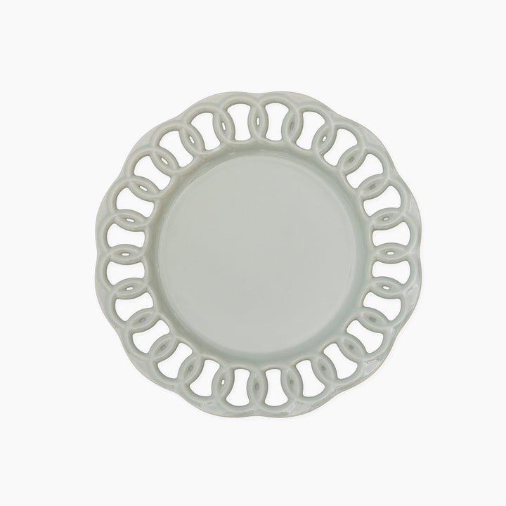 Sage green ceramic salad plate with an intricate openwork lace border