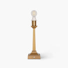 Eiffel cordless table lamp with slender tapered brushed brass body and stepped square base