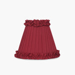 Burgundy pleated lampshade for handcrafted rattan cordless lamp, adding artisan flair to modern home decor.