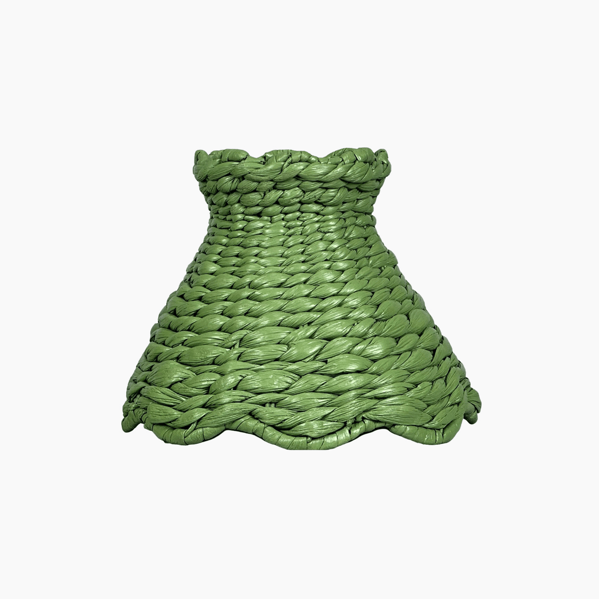 Handcrafted rattan cordless lamp shade made from green woven material, enhancing home decor with style.
