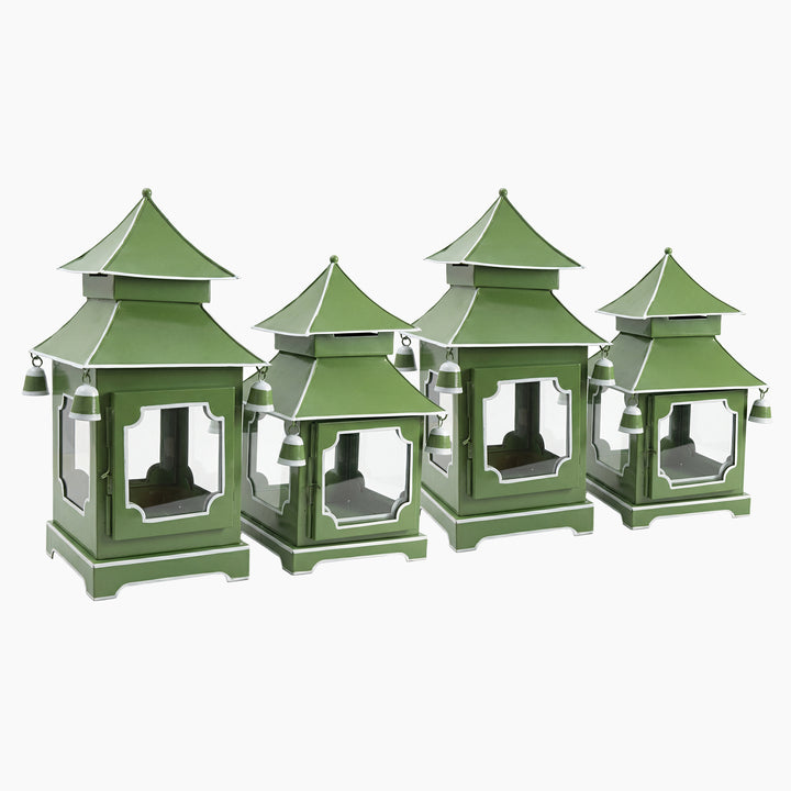 Four green pagoda candle lanterns in two heights
