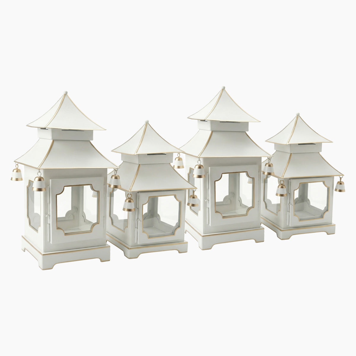 Four ivory pagoda candle lanterns in two heights with gold accents and hanging bells
