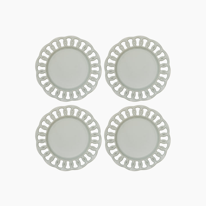 Set of four sage green ceramic salad plates with openwork lace borders