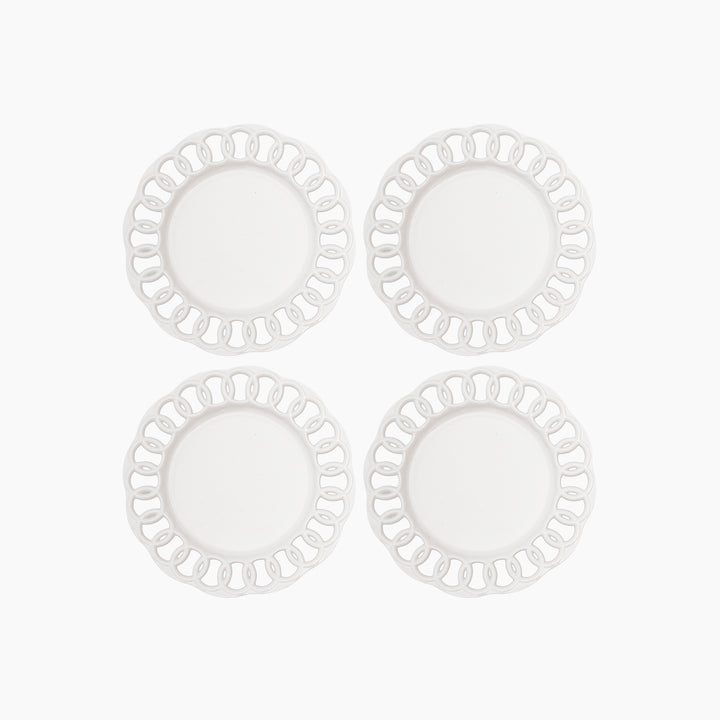 Set of four white ceramic salad plates with openwork lace borders