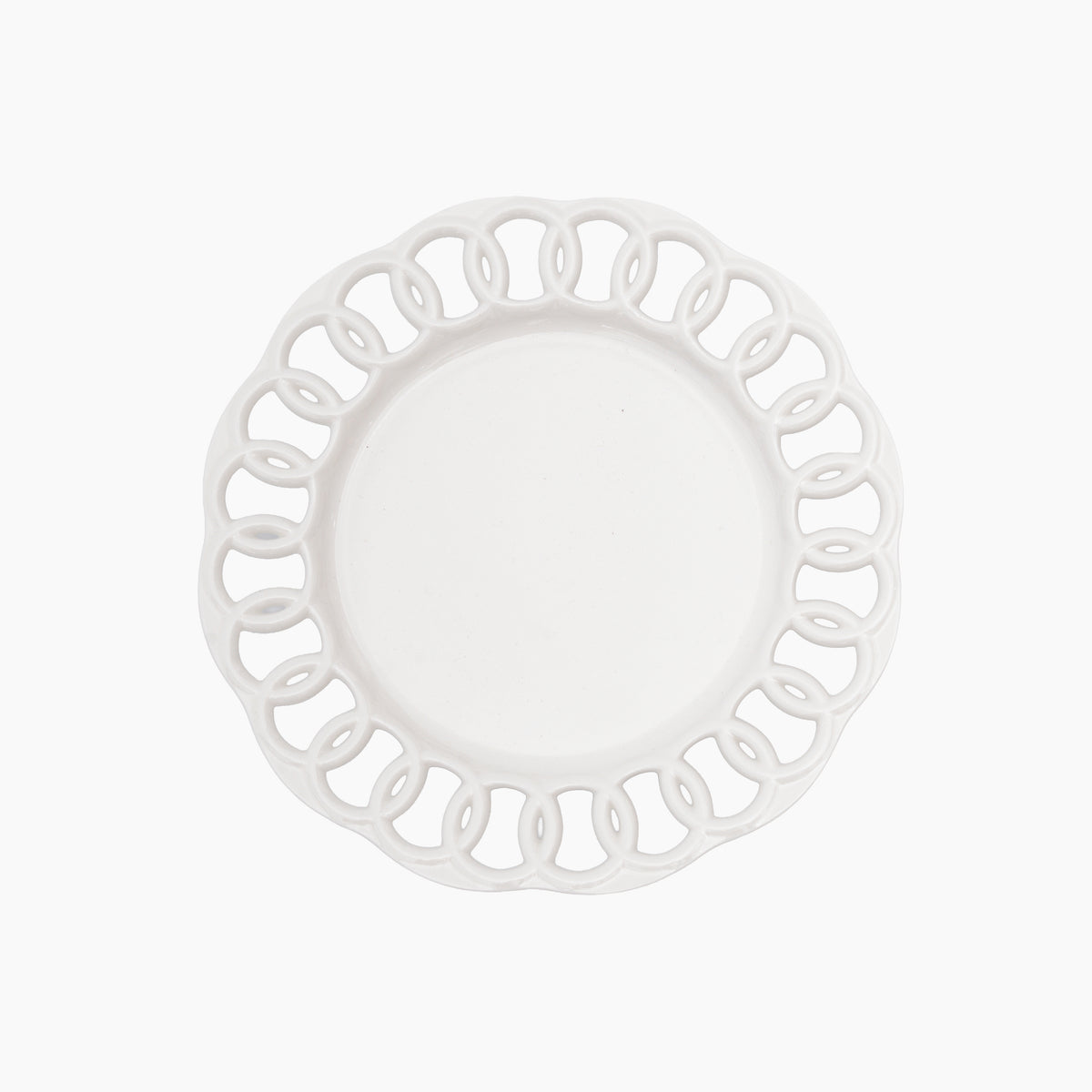 White ceramic salad plate with openwork lace border