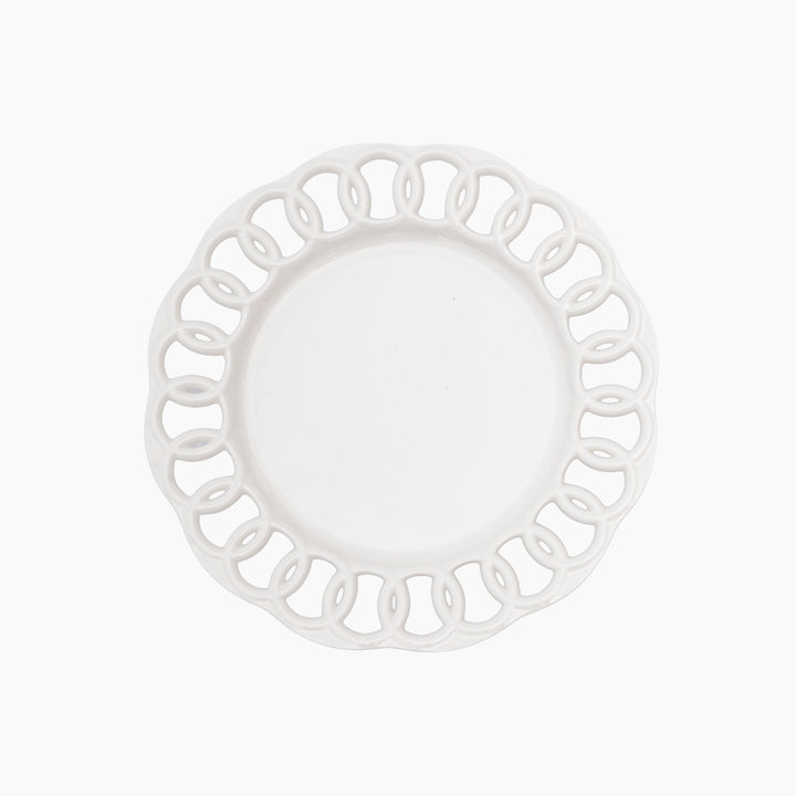 White ceramic salad plate with openwork lace border