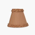 Handcrafted rattan cordless lamp shade with elegant ruffle design in warm beige.