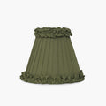 Handcrafted rattan cordless lamp with an olive green pleated fabric shade.