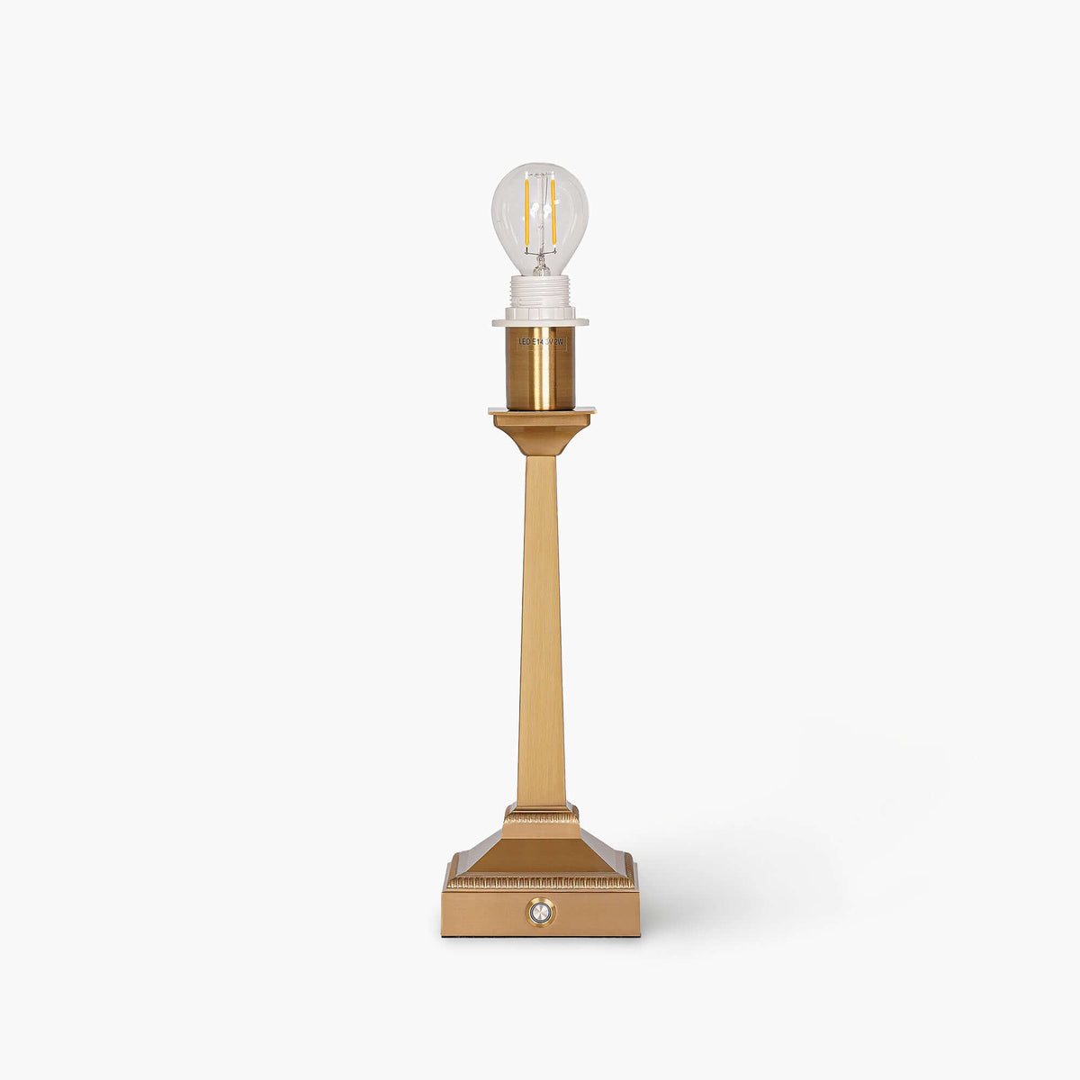 Handcrafted rattan cordless lamp in gold adds a modern touch and elegant ambiance to artisan home decor.