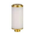 Handcrafted rattan cordless lamp in elegant design with a golden base and frosted glass shade.