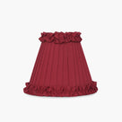 Burgundy pleated lampshade for handcrafted rattan cordless lamp, adding artisan flair to modern home decor.