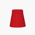 Handcrafted rattan cordless lamp shade in vibrant red velvet with pleats and a bow detail.