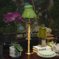 bamboo rechargeable lamp with seagrass shade showcasing artisan craftsmanship and unique design elements in a cozy setting.